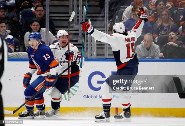 Dmitry Orlov of the Washington Capitals celebrates his game-winning goal in overtime against Ilya Sorokin of the New York Islanders at the UBS Arena...