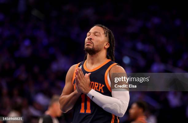 Jalen Brunson of the New York Knicks pauses before the opening tipoff against the Toronto Raptors at Madison Square Garden on January 16, 2023 in New...