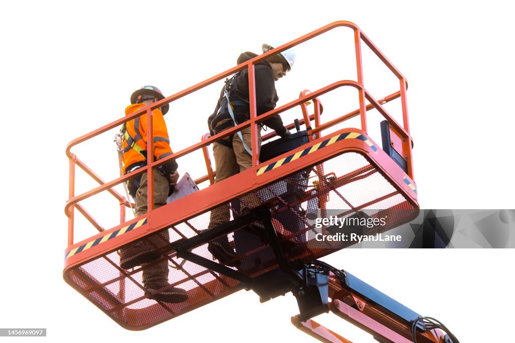 Men Working in Large Industrial Man Lift