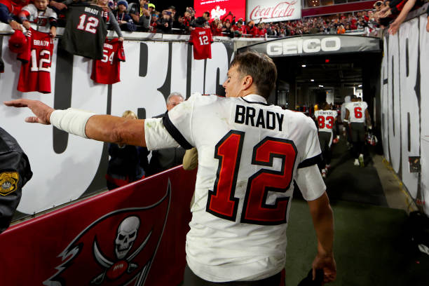 Tom Brady of the Tampa Bay Buccaneers walks off the field after losing to the Dallas Cowboys 31-14 in the NFC Wild Card playoff game at Raymond James...