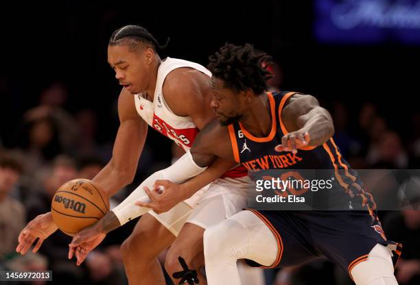 Julius Randle of the New York Knicks makes the steal from Scottie Barnes of the Toronto Raptors during the second half at Madison Square Garden on...
