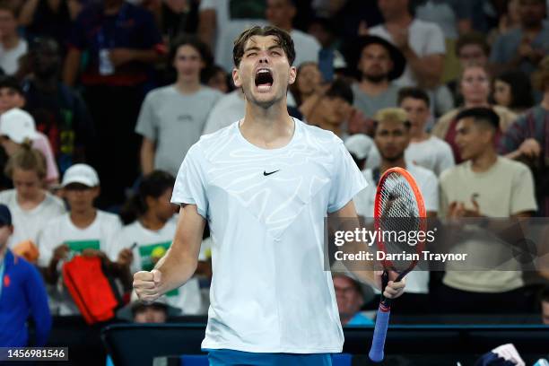 Taylor Fritz of the United States celebrates match point in their round one singles match against Nikoloz Basilashvili of Georgia during day two of...