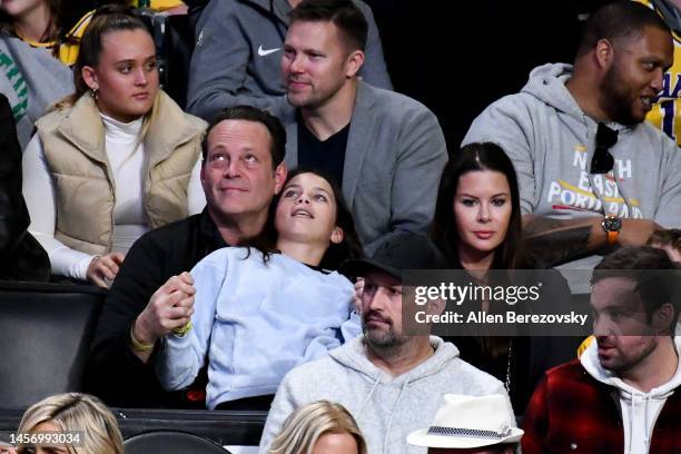 Vince Vaughn, wife Kyla Weber and daughter Lochlyn Kyla Vaughn attend a basketball game between the Los Angeles Lakers and the Houston Rockets at...