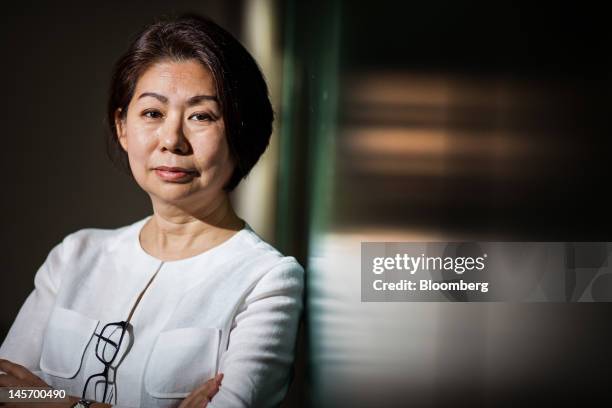 Teresita Sy-Coson, vice chairwoman of SM Investments Corp., poses for a portrait in Manila, the Philippines, on Monday, May 21, 2012. BDO Unibank...