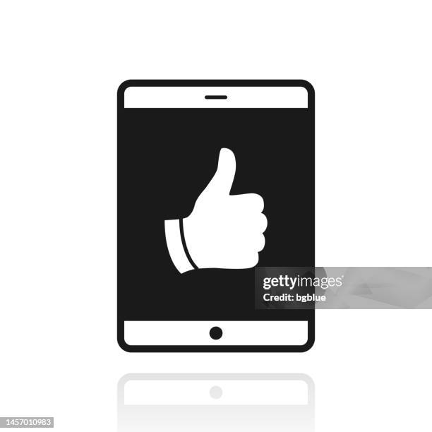 tablet pc with thumbs up. icon with reflection on white background - ipad hand white background stock illustrations