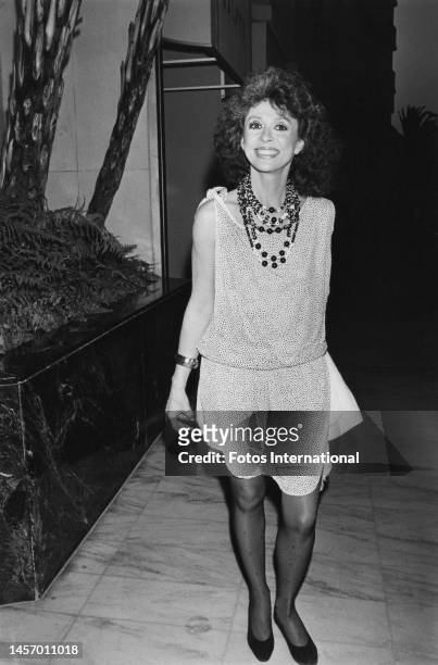 Puerto Rican actress, singer and dancer Rita Moreno, wearing a sleeveless mid-length dress and beaded necklaces, at Spago in West Hollywood,...