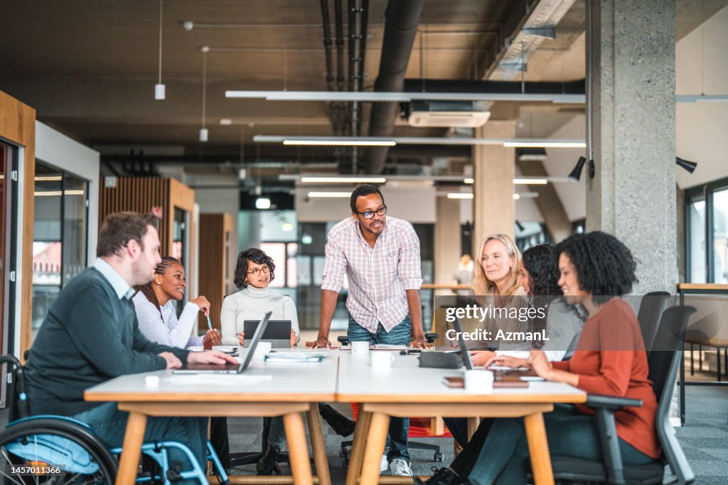 Open Concept Office, Where a Work Meeting is Being Held