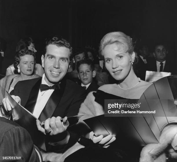 American television director Jeffrey Hayden , wearing a tuxedo and bow tie. And his wife, American actress Eva Marie Saint, wearing a black...