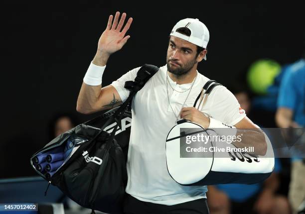 Matteo Berrettini of Italy acknowledges the crowd after defeat in their round one singles match against Andy Murray of Great Britain during day two...