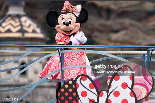 An actor dressed as the Walt Disney character Minnie Mouse performs during a press preview for the "Minnie Besties Bash!" parade at Tokyo DisneySea...