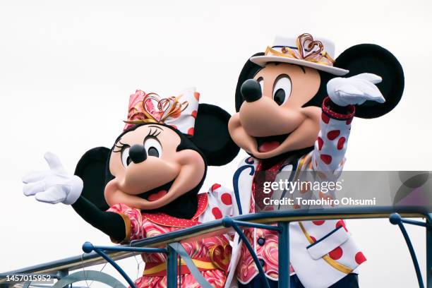 Actors dressed as Walt Disney characters Minnie Mouse and Mickey Mouse perform during a press preview for the "Minnie Besties Bash!" parade at Tokyo...