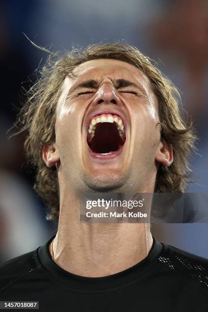 Alexander Zverev of Germany celebrates match point in their round one singles match against Juan Pablo Varillas of Peru during day two of the 2023...