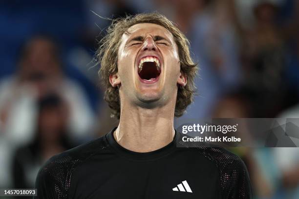 Alexander Zverev of Germany celebrates match point in their round one singles match against Juan Pablo Varillas of Peru during day two of the 2023...