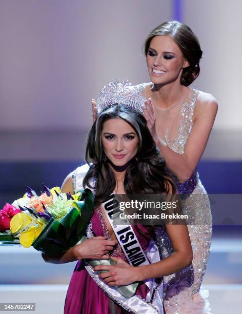 Miss USA 2011 Alyssa Campanella crowns Miss Rhode Island USA Olivia Culpo the 2012 Miss USA during the 2012 Miss USA pageant at the Planet Hollywood...