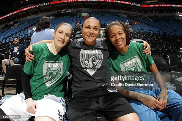 Erin Thorn of the Minnesota Lynx, Tully Bevilaqua of the San Antonio Silver Stars and Seimone Augustus of the Minnesota Lynx pose for a photo during...