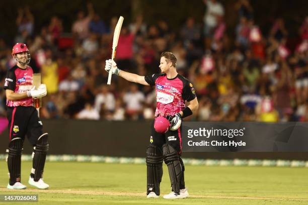 Steve Smith of the Sixers celebrates a century during the Men's Big Bash League match between the Sydney Sixers and the Adelaide Strikers at Coffs...
