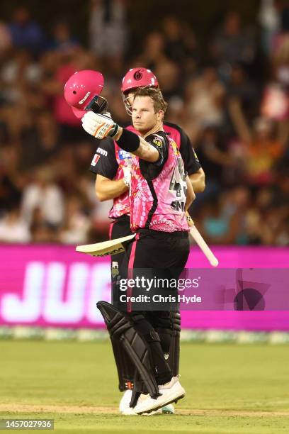 Steve Smith of the Sixers celebrates a century during the Men's Big Bash League match between the Sydney Sixers and the Adelaide Strikers at Coffs...