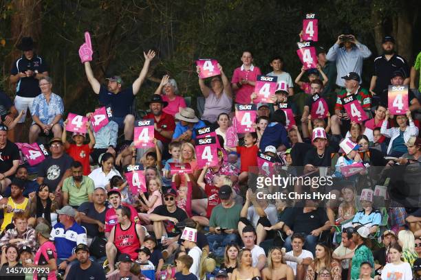 Fans cheer during the Men's Big Bash League match between the Sydney Sixers and the Adelaide Strikers at Coffs Harbour International Stadium, on...