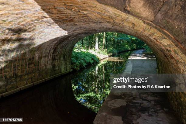 bridge on the huddersfield canal, uppermill, greater manchester, england - oldham stock pictures, royalty-free photos & images