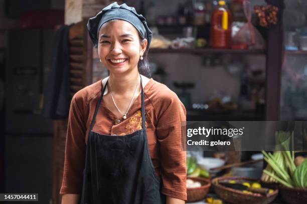 portrait of young smiling vietnamese female chef  in restaurant - hot vietnamese women stock pictures, royalty-free photos & images