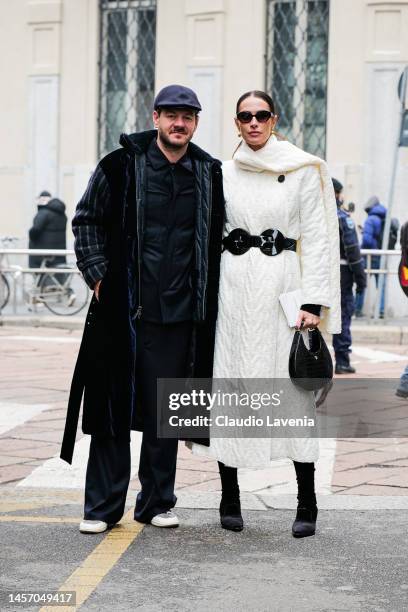Alessandro Cattelan, wearing a long coat, black shirt and black pants and Ludovica Sauer wearing a long withe coat and a black belt, are seen outside...