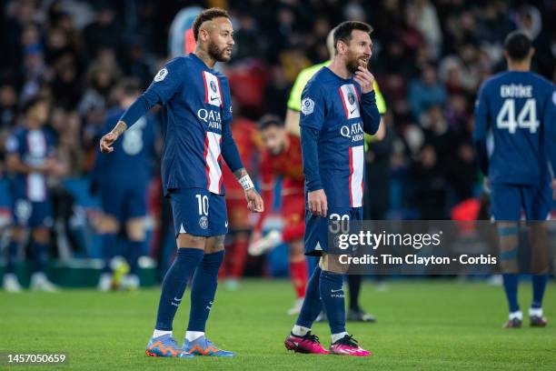 January 11: Neymar of Paris Saint-Germain and Lionel Messi of Paris Saint-Germain share a lighthearted moment during the Paris Saint-Germain V...