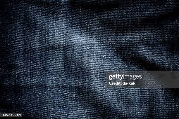 jeans denim texture close-up - denim stock pictures, royalty-free photos & images