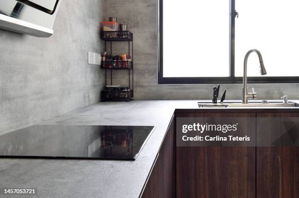 induction stove in a modern home kitchen - electric stove burner ストックフォトと画像