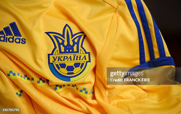 Picture taken on June 3, 2012 in Paris, shows the jersey of the Ukainian football federation. AFP PHOTO / FRANCK FIFE