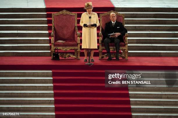 Britain's Queen Elizabeth II gives a speech in response to Loyal Addresses marking her Diamond Jubilee presented to her from both Houses of...