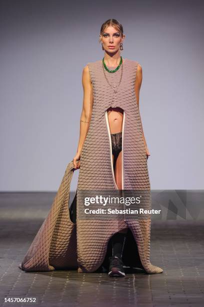 Model walks the runway at the Rebekka Ruétz show during the W.E4. Fashion Day as part of Berlin Fashion Week AW23 at Bolle Festsaele on January 17,...