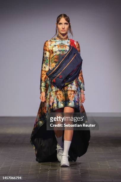 Model walks the runway at the Rebekka Ruétz show during the W.E4. Fashion Day as part of Berlin Fashion Week AW23 at Bolle Festsaele on January 17,...