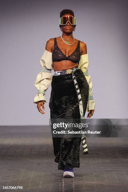 Model walks the runway at the Rebekka Ruétz show during the W.E4. Fashion Day as part of Berlin Fashion Week AW23 at Bolle Festsaele on January 17,...