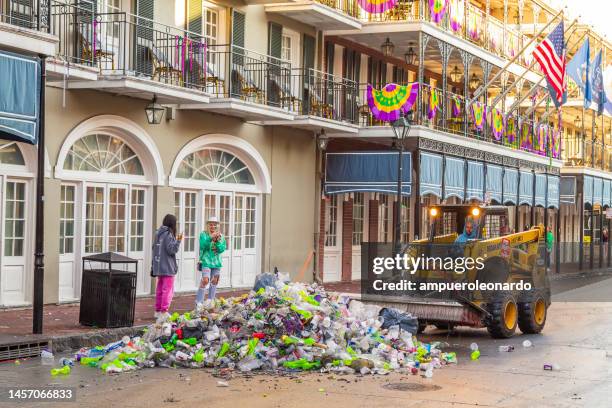 new orleans mardi gras' after the night party - a completely photojournalism after the night in the biggest carnivals around the world. - cleaning after party stock pictures, royalty-free photos & images