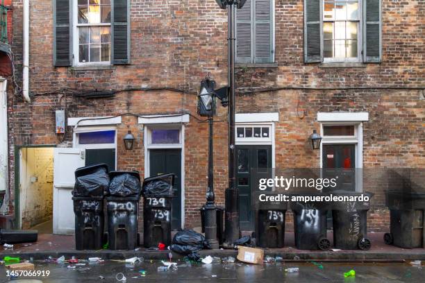 new orleans mardi gras' after the night party - a completely photojournalism after the night in the biggest carnivals around the world. - after party garbage stock pictures, royalty-free photos & images