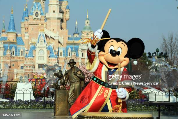 Disney character Mickey Mouse welcomes visitors at the Shanghai Disney Resort as the resort kicked off a month of festivities from January 13 to...