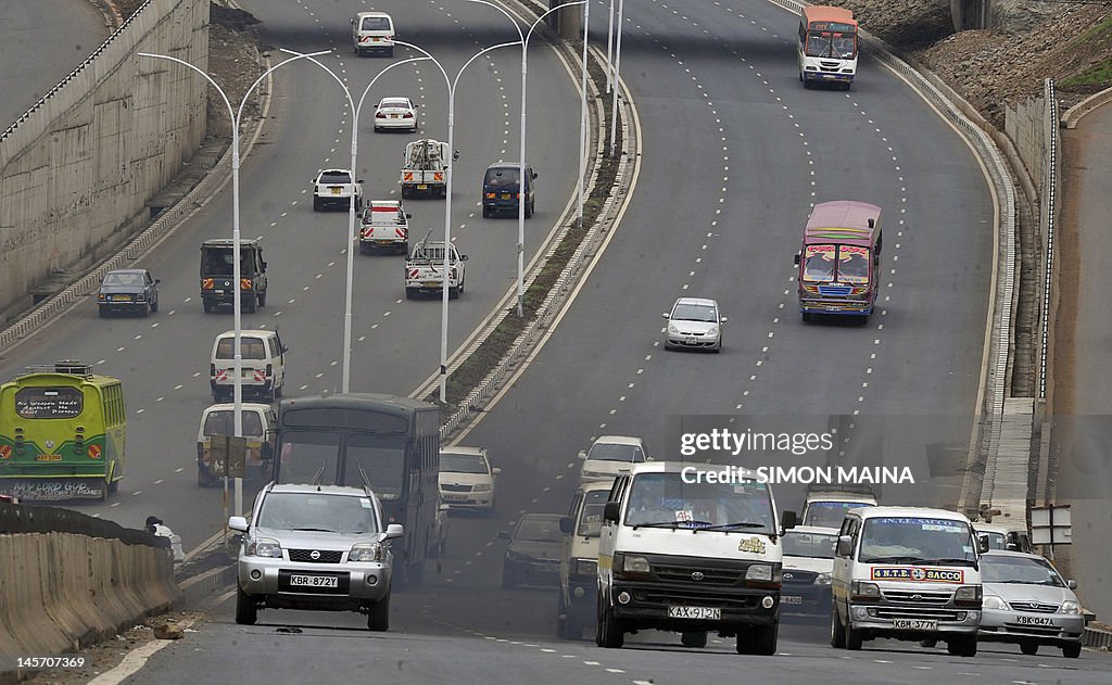 Kenyan motorists drive on June 4, 2012 o