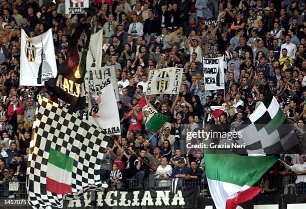 Juventus fans watch the action during the Serie A match between Juventus and parma, played at the Stadio Delle Alpi, Turin, Italy on September 28,...