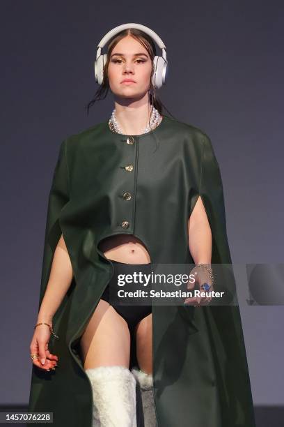 Model walks the runway at the Rebekka Ruétz show during the W.E4. Fashion Day as part of Berlin Fashion Week AW23 at Bolle Festsaele on January 17,...