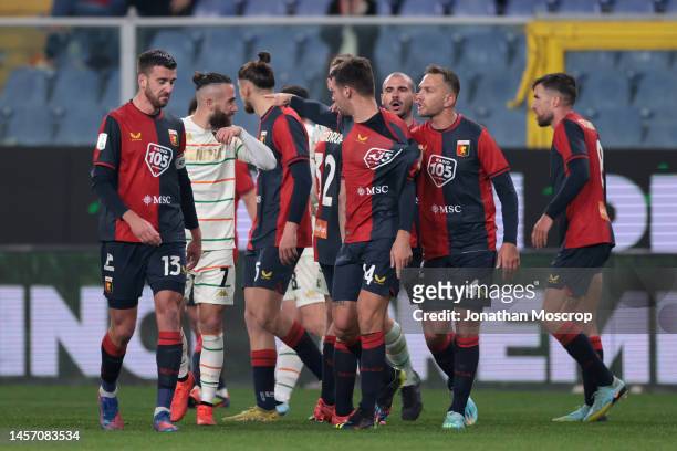 Francesco Zampano of Venezia FC looks on as Alessandro Vogliacco of Genoa CFC's team mates attempt to calm him following a clash with Ridgeciano Haps...