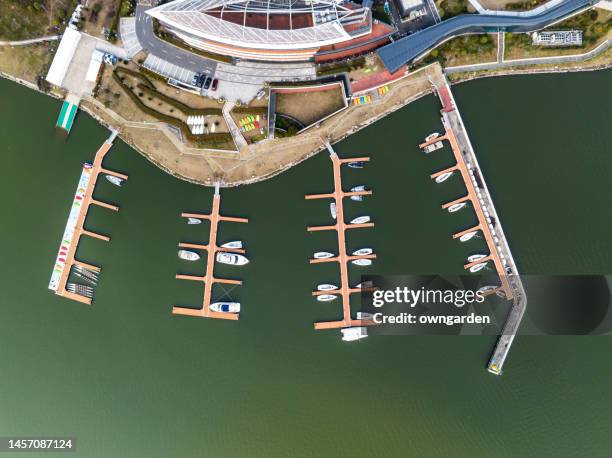 aerial drone view of luxury yacht marina - spartan cruiser stock pictures, royalty-free photos & images