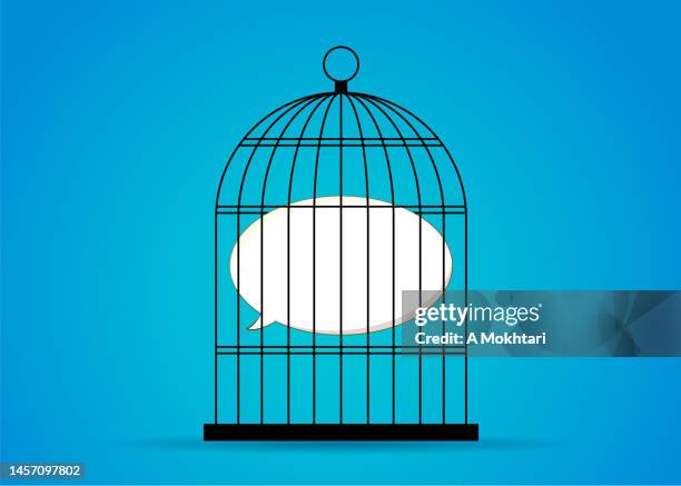 freedom of speech, a prisoner in a cage speech bubble. - cage stock illustrations