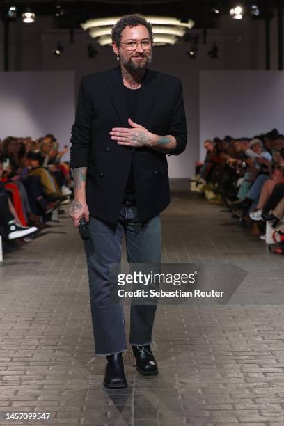 Designer Marcel Ostertag walks the runway at the AW23 'DISCOTECA' Fashion Show by Marcel Ostertag during the W.E4.FASHIONDAY as part of Berlin...