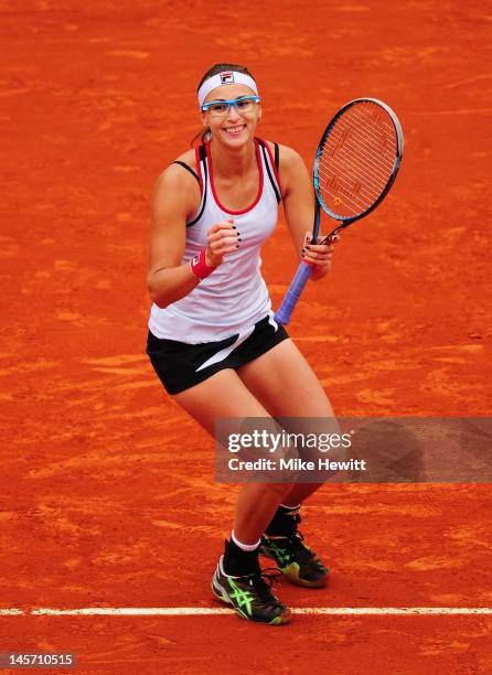 Yaroslava Shvedova of Kazakhstan celebrates victory in her women's singles fourth round match against Na Li of China during day 9 of the French Open...