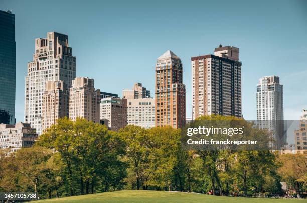 cityscape in central park - upper east side manhattan stock pictures, royalty-free photos & images