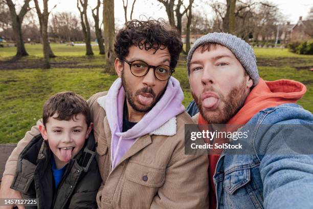 silly selfies in the park - group young people stock pictures, royalty-free photos & images