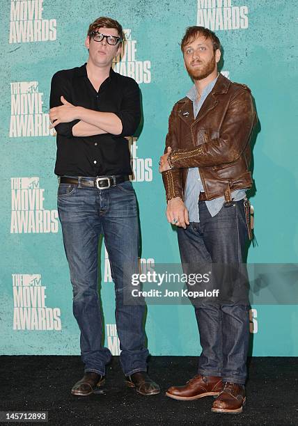 Musicians Patrick Carney and Dan Auerbach of The Black Keys pose at the 2012 MTV Movie Awards Press Room at Gibson Amphitheatre on June 3, 2012 in...