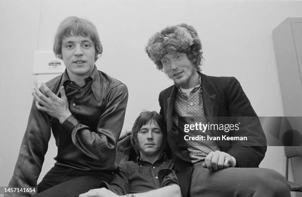 From left, Jack Bruce , Eric Clapton and Ginger Baker of British rock group Cream posed in their dressing room at Associated Rediffusion's Wembley...