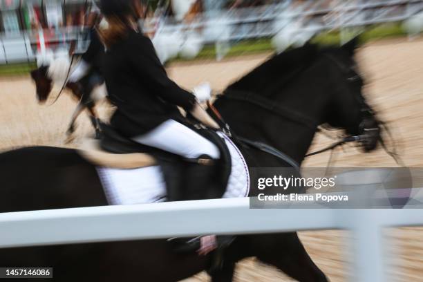 defocused racehorse riding fast - horse trials stock pictures, royalty-free photos & images