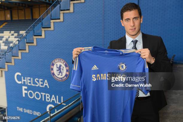 Eden Hazard poses with a team shirt after agreeing terms with Chelsea FC at Stamford Bridge on June 4, 2012 in London, England.